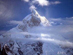 peak-of-the-icy-mountain-in-between-clouds